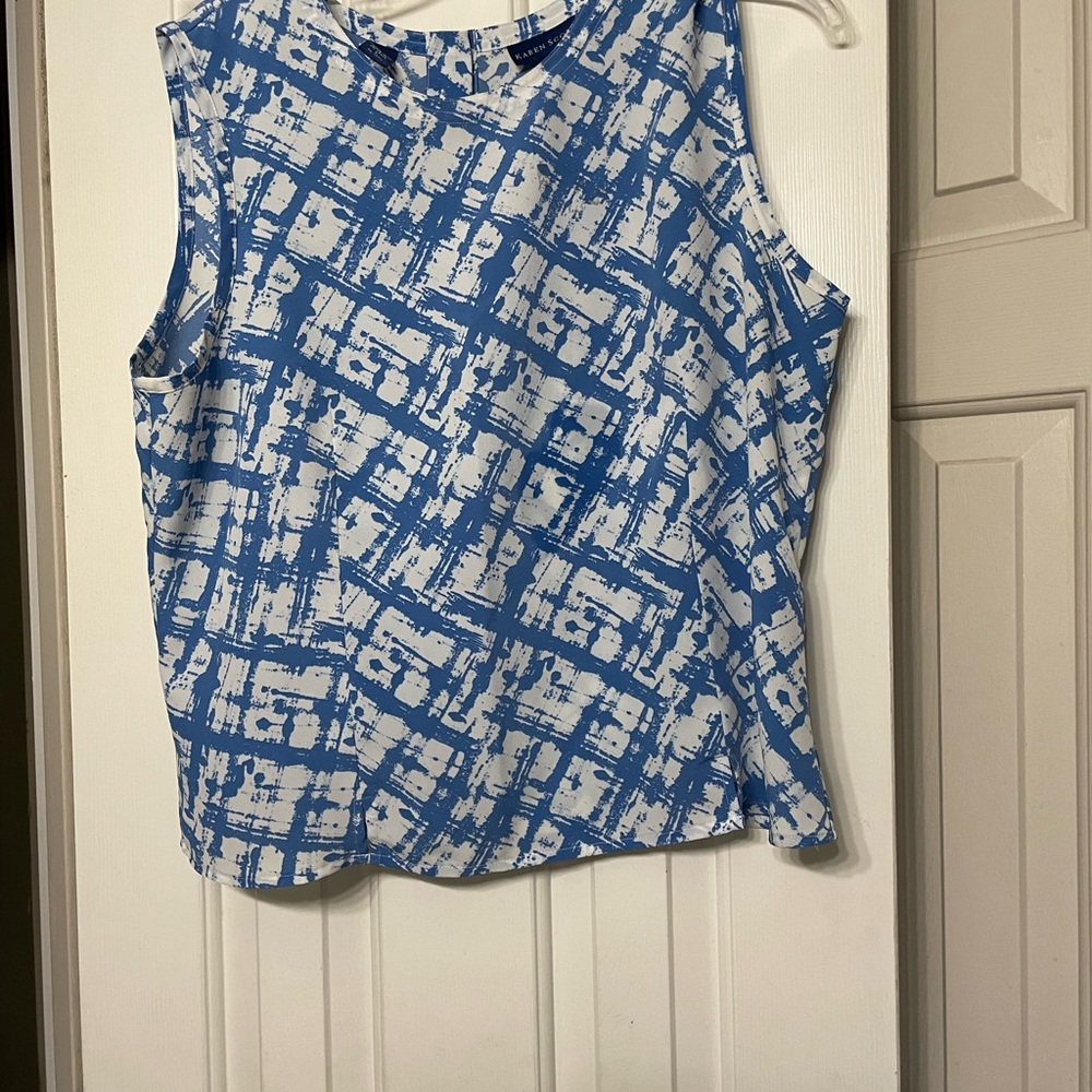 Preowned woman blouse, sleeveless size large